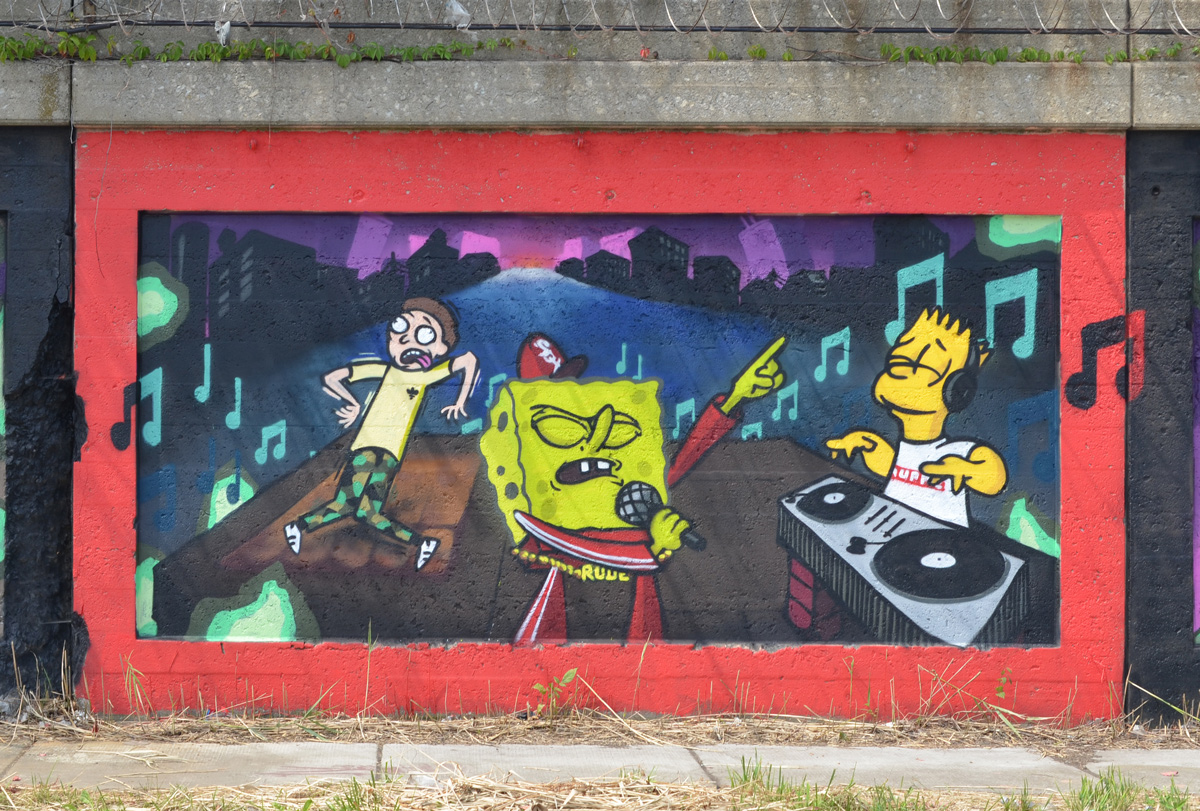 mural on South Wood street in pilsen illinois, a dance scene with an angry sponge bob square pants singing while Bart Simpson is the D J with two turn tables, a man is trying to dance 