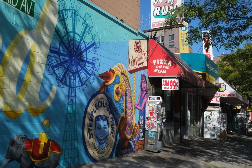 far right end of welcome to coney island mural, beside a pizza restaurant