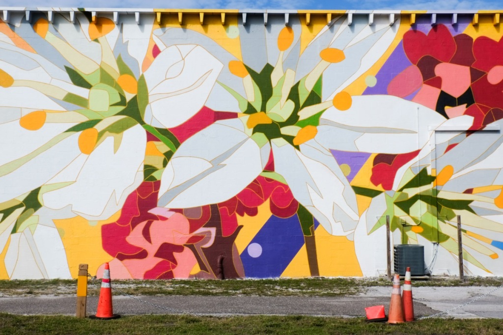large white flower in a mural by d a a s